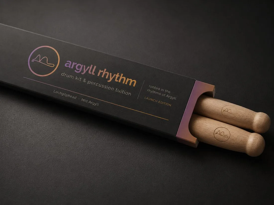 Argyll Rhythm drumstick packaging in heather-to-amber gradient.