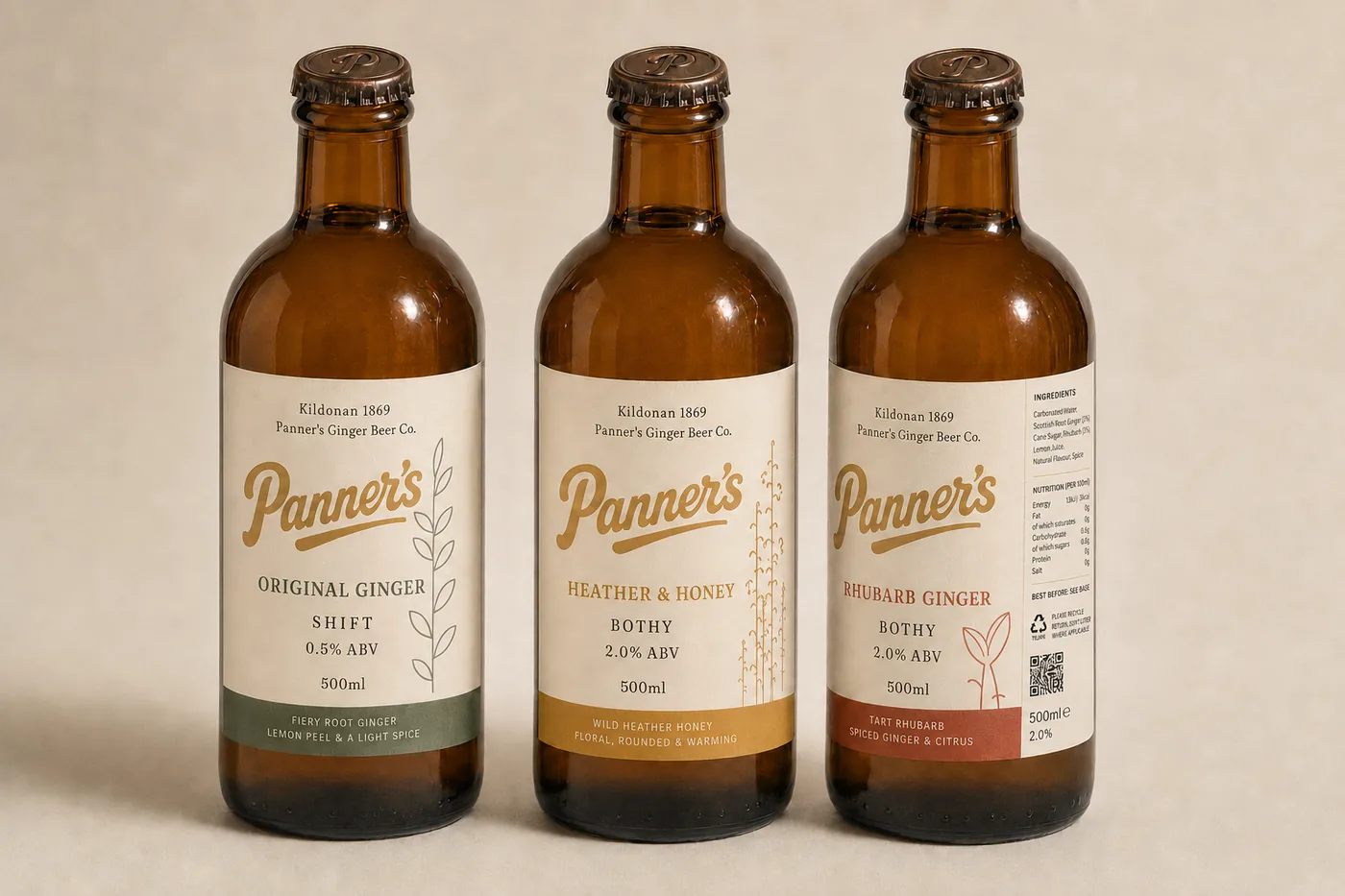 The three Panner's bottles side by side in amber glass: Original Ginger, Heather & Honey and Rhubarb Ginger.