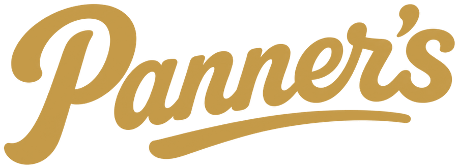 The Panner's wordmark, hand-drawn script with a long swash, in Baile Gold on oat.